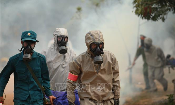 Qu&acirc;n đội diễn tập ph&ograve;ng thủ d&acirc;n sự li&ecirc;n tỉnh ứng ph&oacute; sự cố m&ocirc;i trường