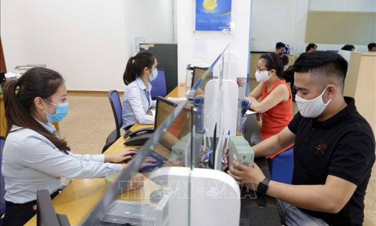 Ng&acirc;n h&agrave;ng đảm bảo cung ứng đủ lượng tiền mặt trong dịp Tết