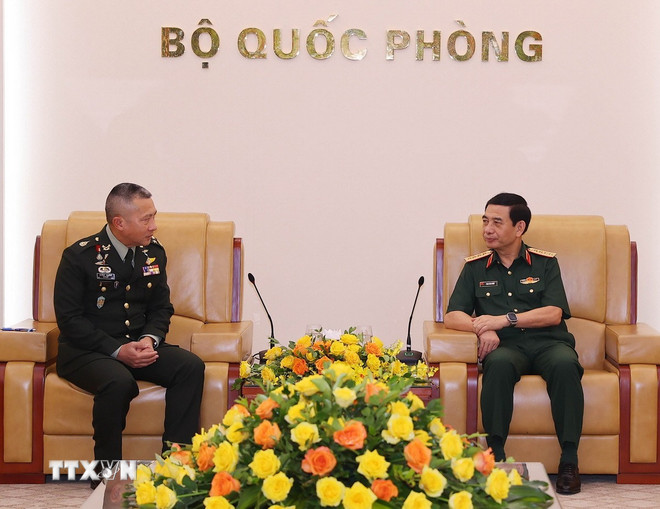 Đại tướng, Bộ trưởng Quốc phòng Phan Văn Giang tiếp Đại tướng Songwit Noonpackdee, Tư lệnh Lực lượng Quốc phòng Thái Lan. (Ảnh: Trọng Đức/TTXVN)