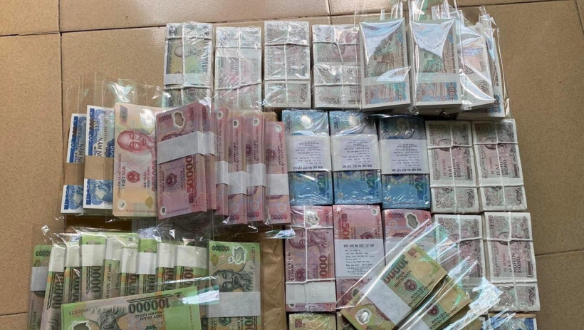 Đổi tiền mới dịp Tết - Cẩn thận vi phạm ph&aacute;p luật