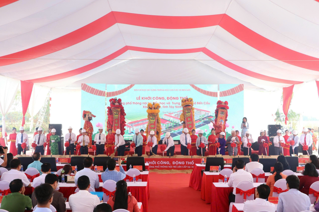 Delegates perform the groundbreaking ritual for the project